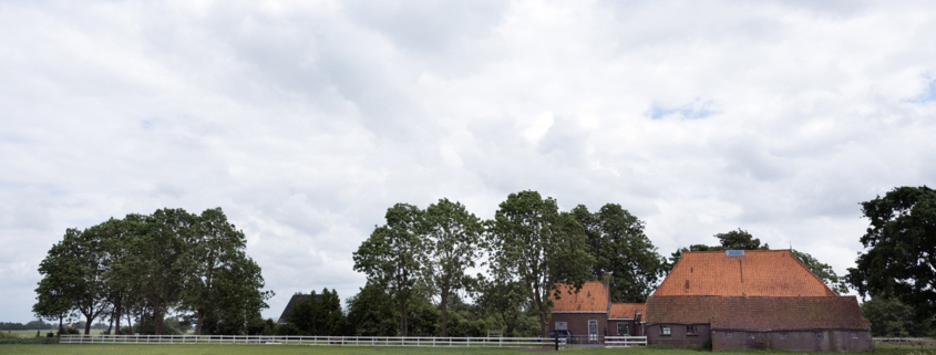 Woonboerderij met schuur, paardenbak en weiland 10,4% of 2% overdrachtsbelasting